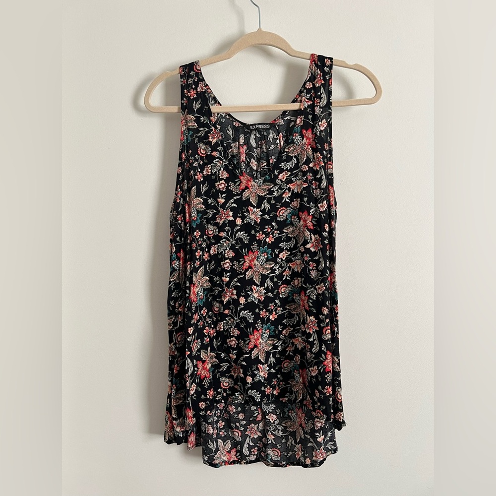 Rayon floral sleeveless top.